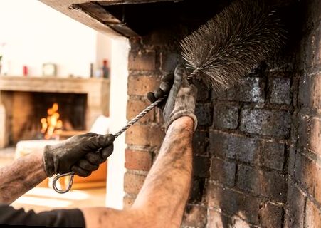 Ring brush cleaning soot from a Westchester firebox